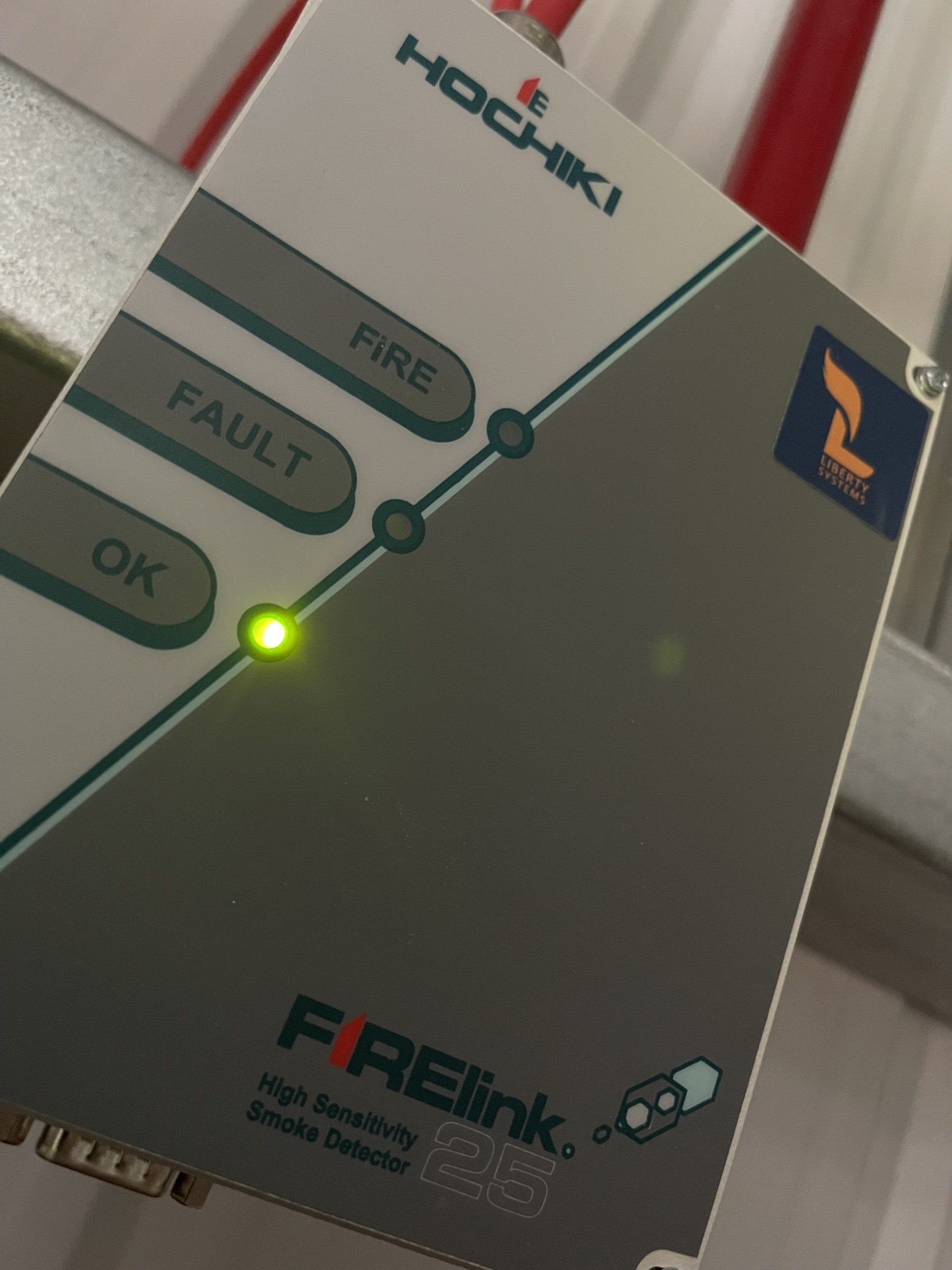 Hochiki FIRElink unit in a warehouse ceiling void