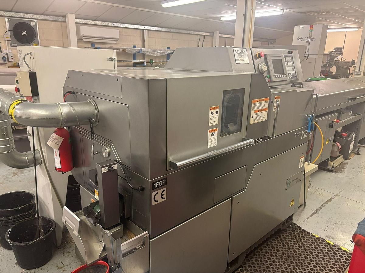 A large machine is sitting in a factory.