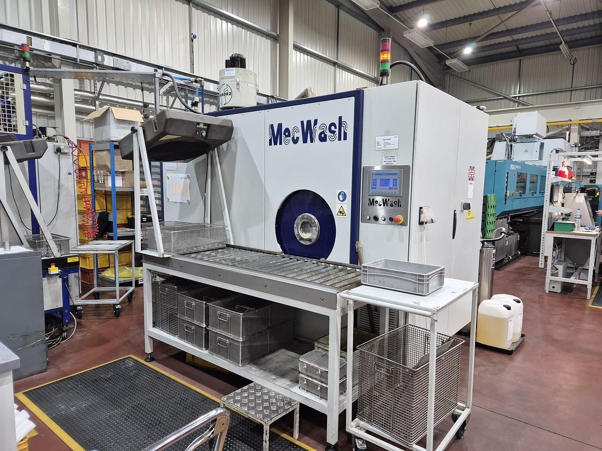 A large machine is sitting in a factory.