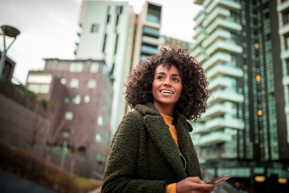 Smiling Woman At The City — Riverdale, GA — Tara Gynecology