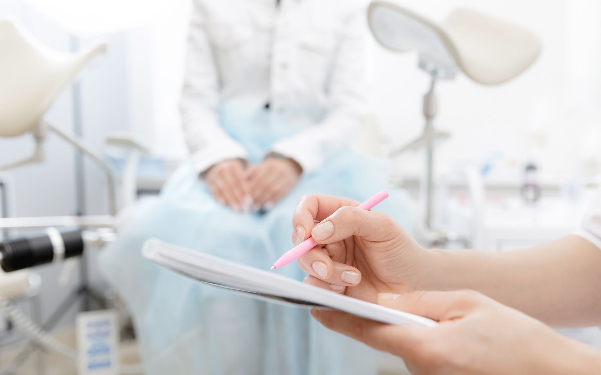A young woman patient at a gynecologist appointment consults at an abortion clinic. A young woman patient at a gynecologist appointment consults at an abortion clinic.