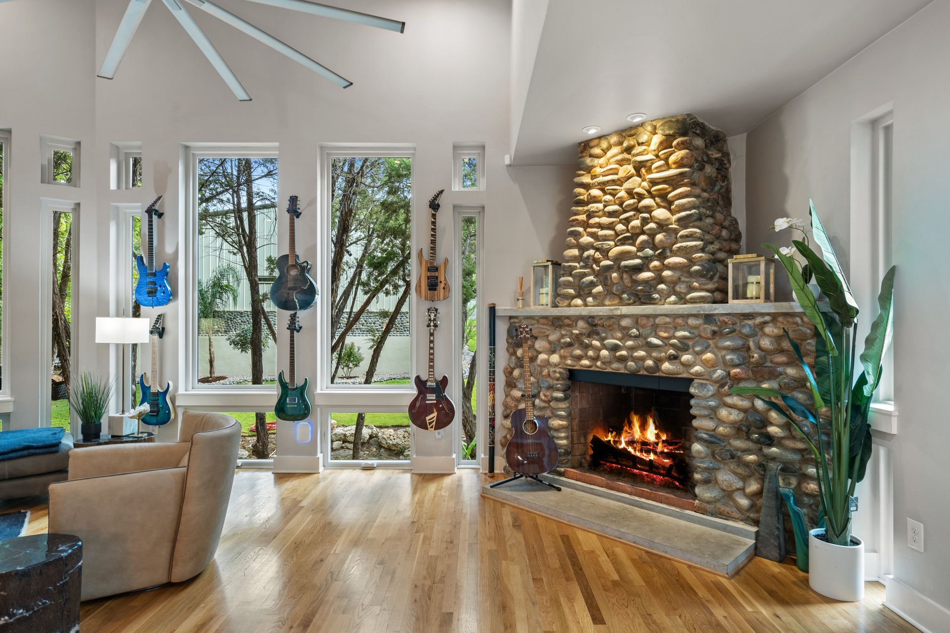 sophisticated luxury living room with large stone fire place.
