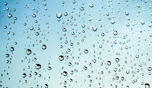 Water beading on a protected vehicle surface after nanolayer treatment