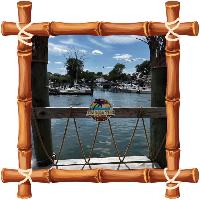 Tiki-style wooden frame around a marina view with boats, water, and blue sky