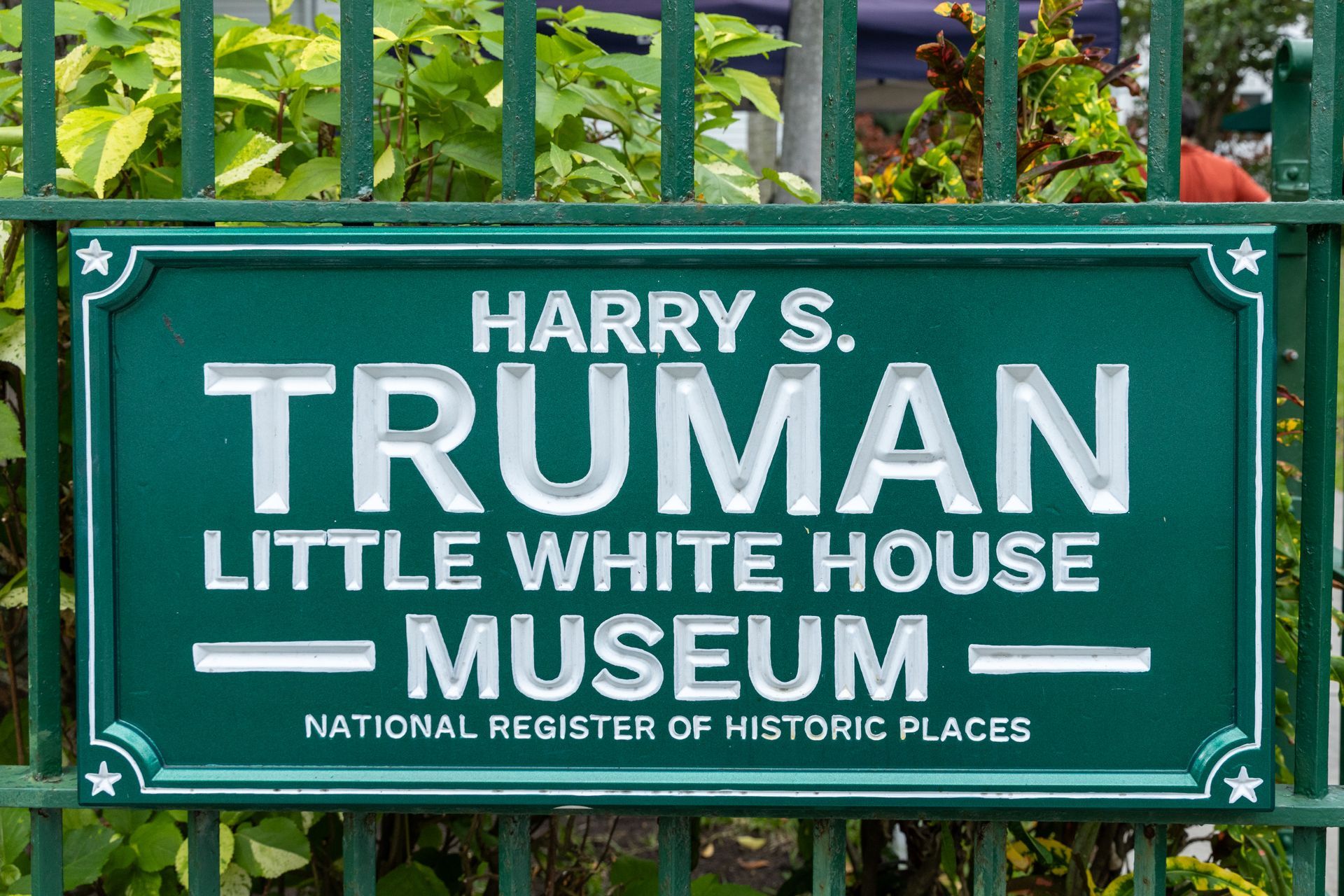 Green sign for Harry S. Truman Little White House Museum, National Register of Historic Places