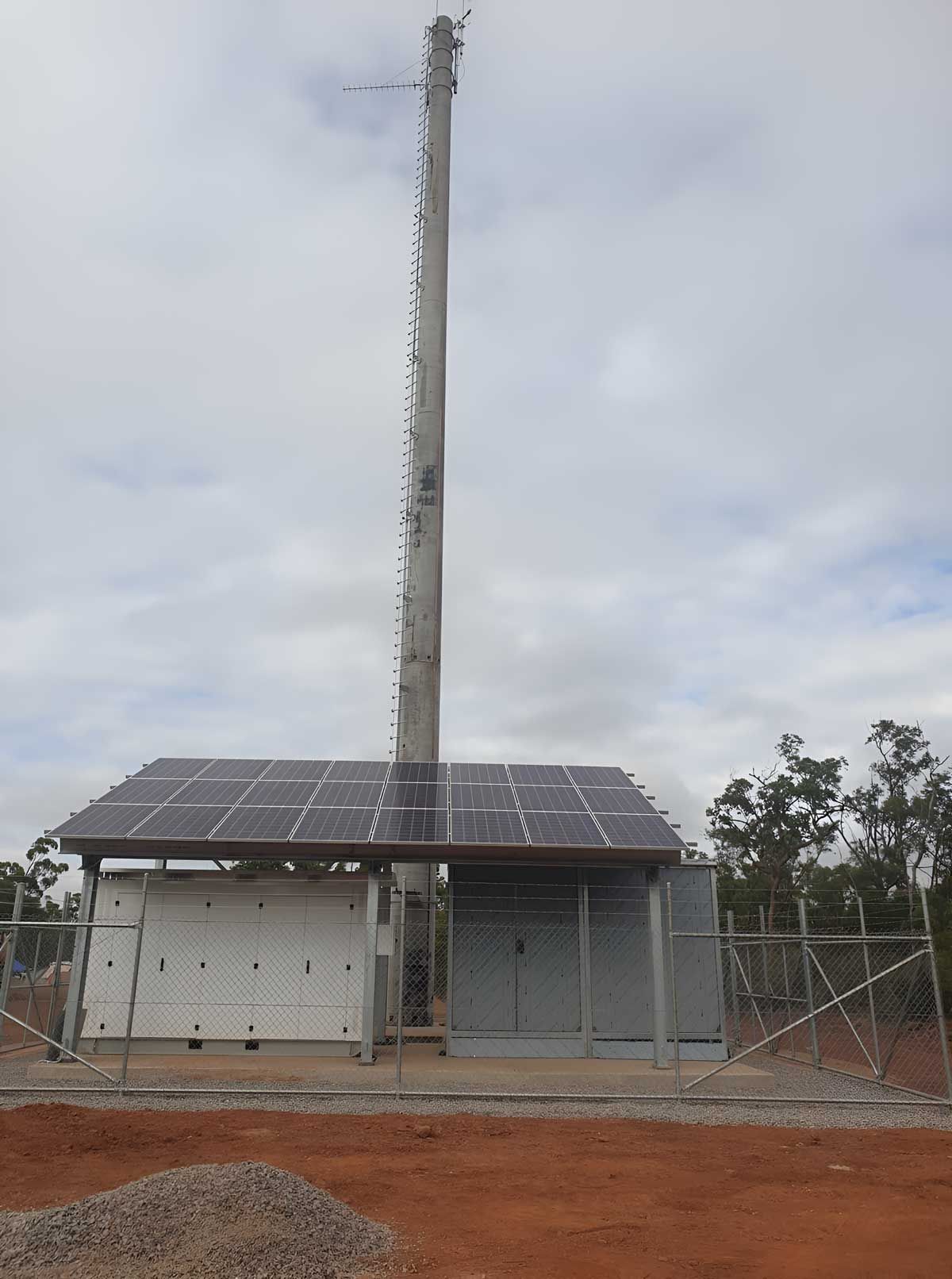 A Shed With Solar Panel And Big Crane — Austen Landscaping & Earthmoving in Deeragun, QLD