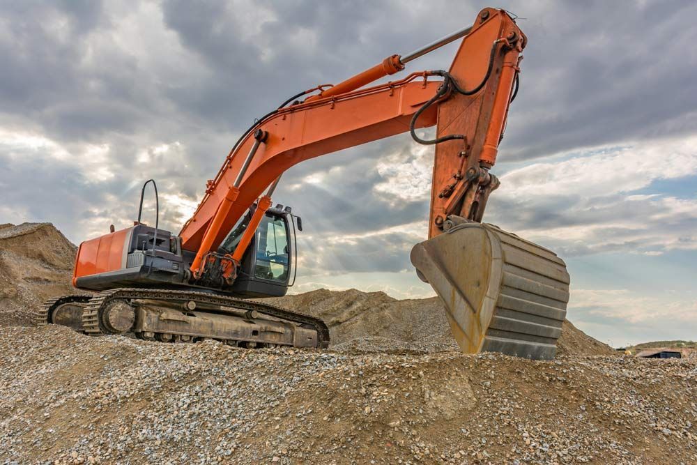 Excavators and heavy machinery in the working Site — Austen Landscaping & Earthmoving in Deeragun, QLD