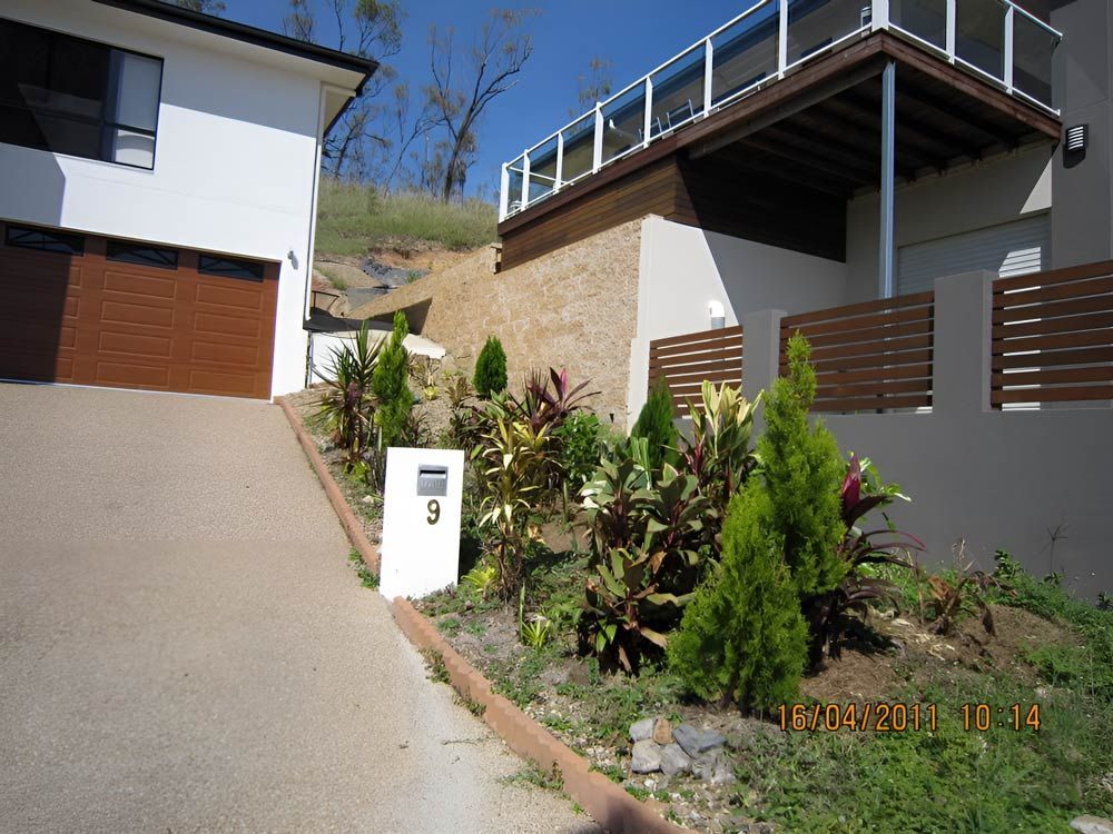 A House With Garden And Number 9 On The Side Of It — Austen Landscaping & Earthmoving in Deeragun, QLD