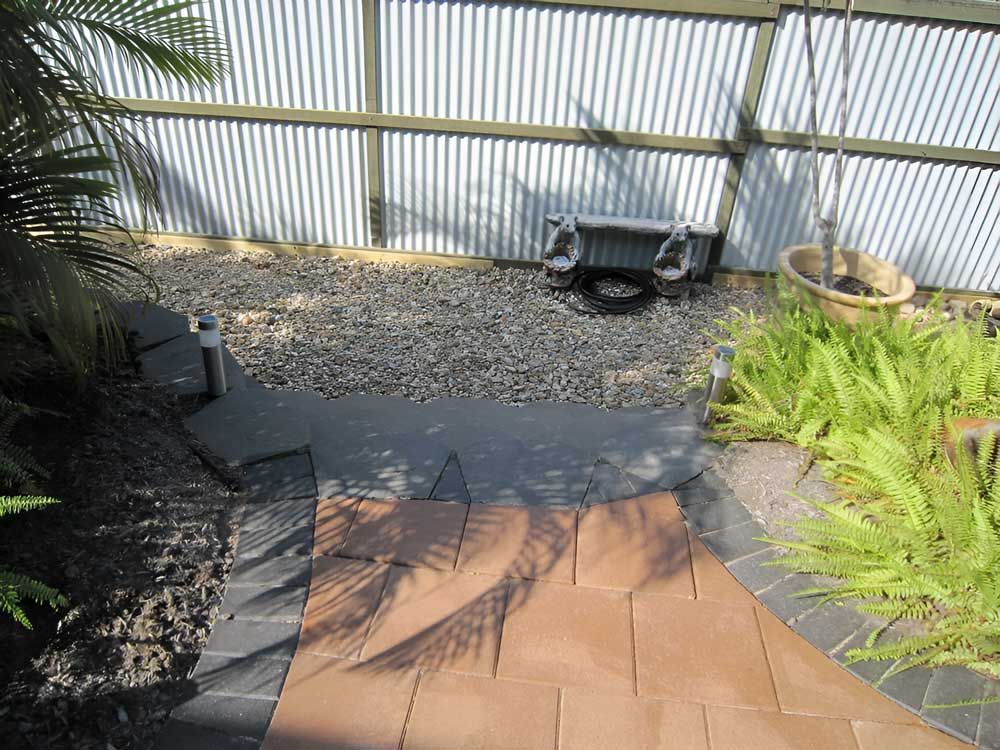 A Garden Featuring A Brick Installation Design — Austen Landscaping & Earthmoving in Deeragun, QLD