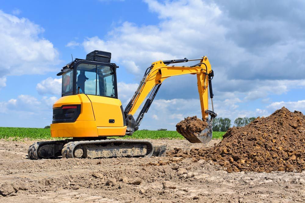 Yellow Earthmoving Equipment — Austen Landscaping & Earthmoving in Ayr, QLD