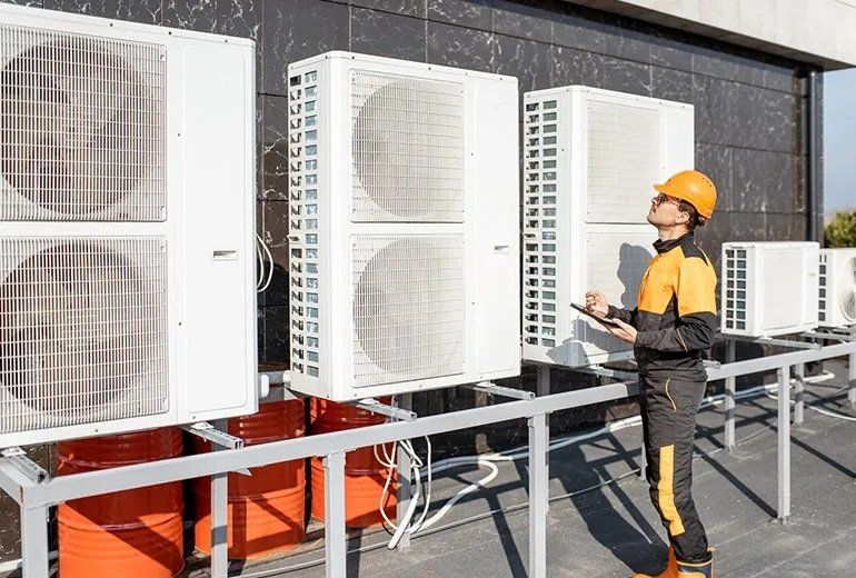 Man checking HVAC