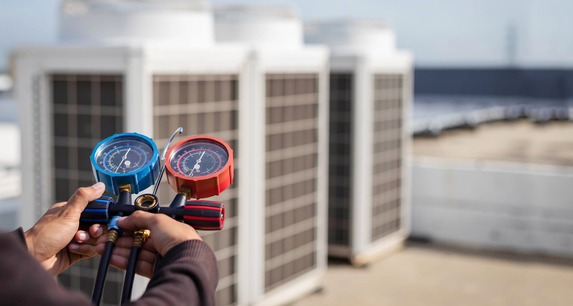 Man holding manometer