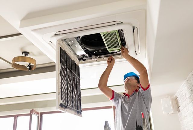 Man repairing the aircon