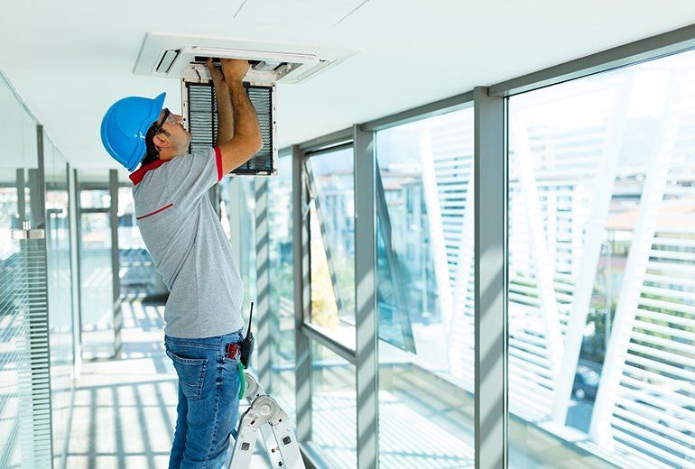 Man doing cooling system adjustments