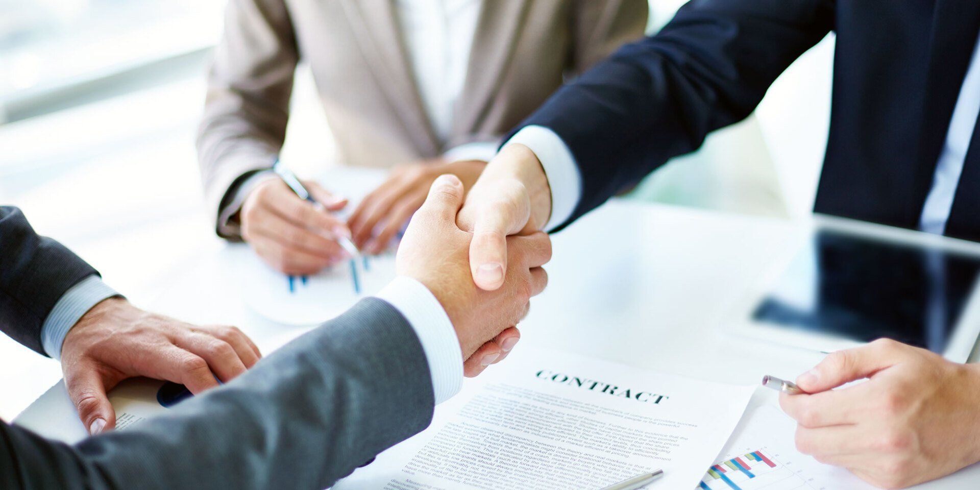 two people shaking hands