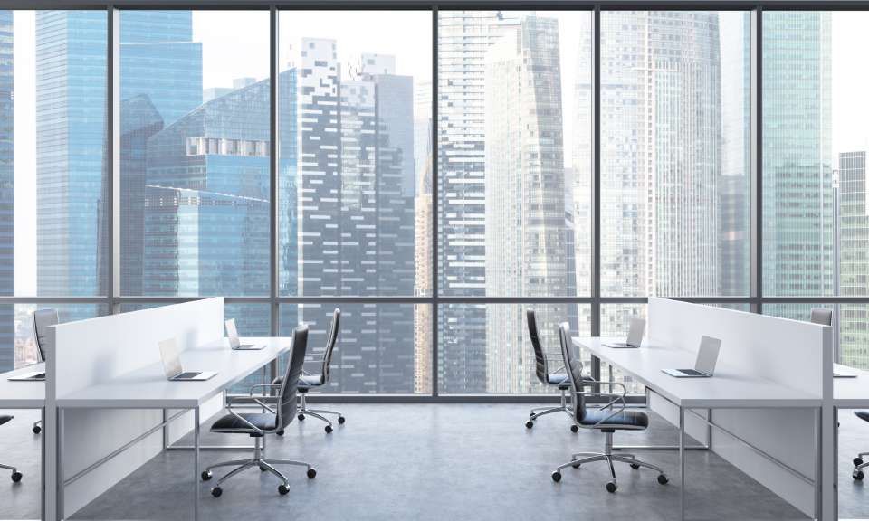 Workplaces in a bright modern open space office