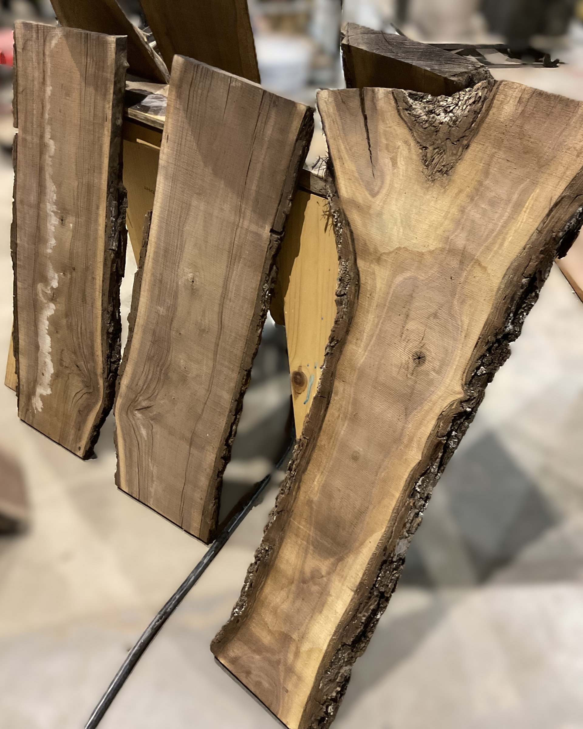 A bunch of wood pieces hanging on a wire