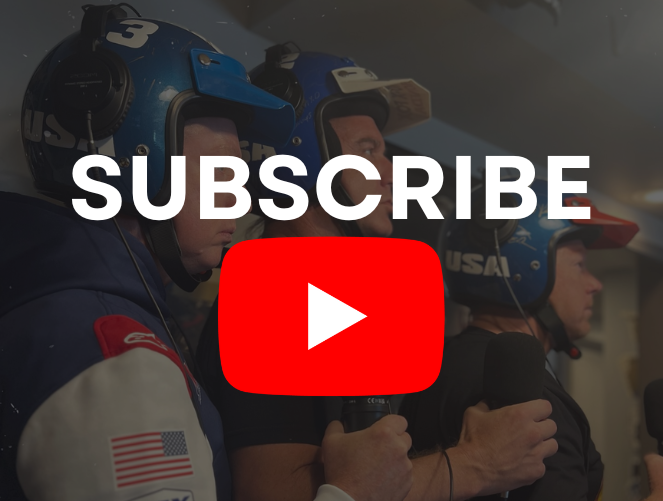 Subscribe button overlaid on men in helmets, possibly athletes, in a dimly lit room.
