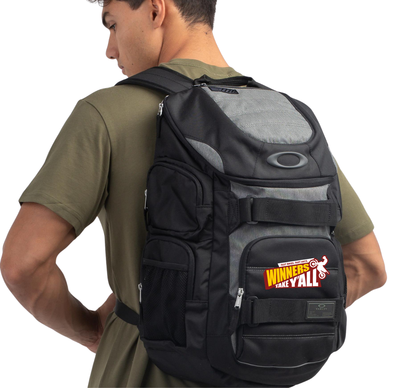 Man wearing a black Oakley backpack with a