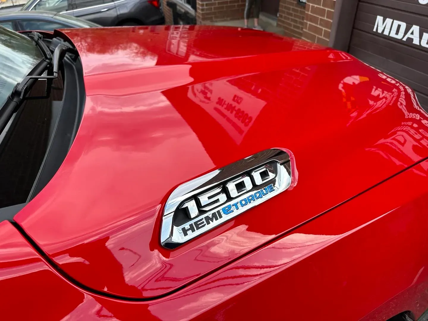 ceramic coating on red car