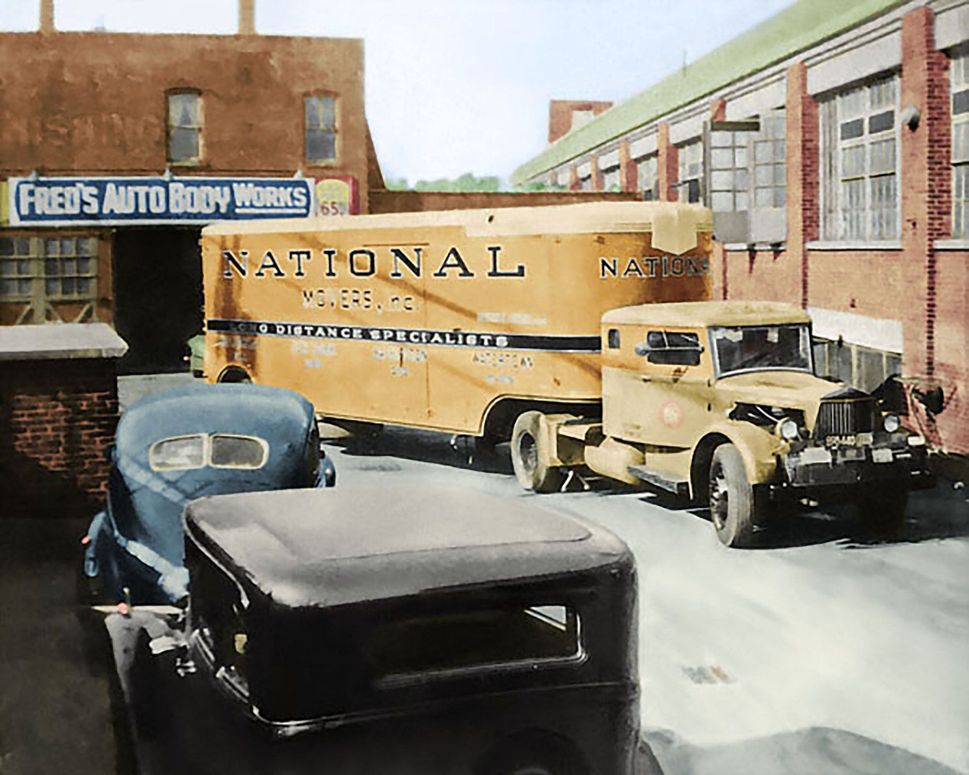 A national truck is parked in front of a building