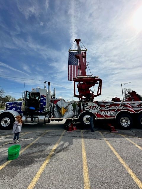 Towing Truck with American Flag Side View — Fort Wayne, IN — Blue Eagle Towing