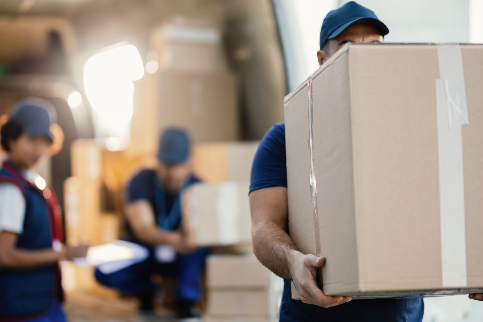 Movers unloading a truck