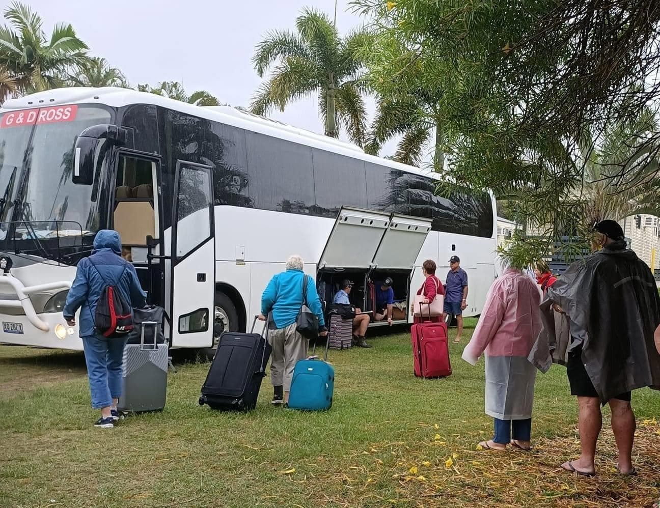 Passengers Going to Their Charter Bus