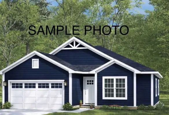 Blue single-story house with white trim, garage, and front porch under a “SAMPLE PHOTO” label