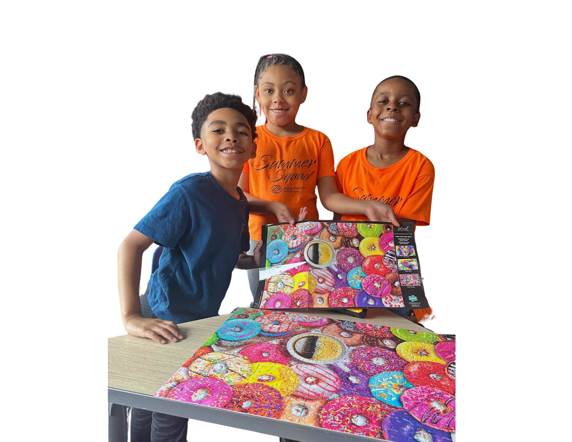 Five smiling children posing together against a white background