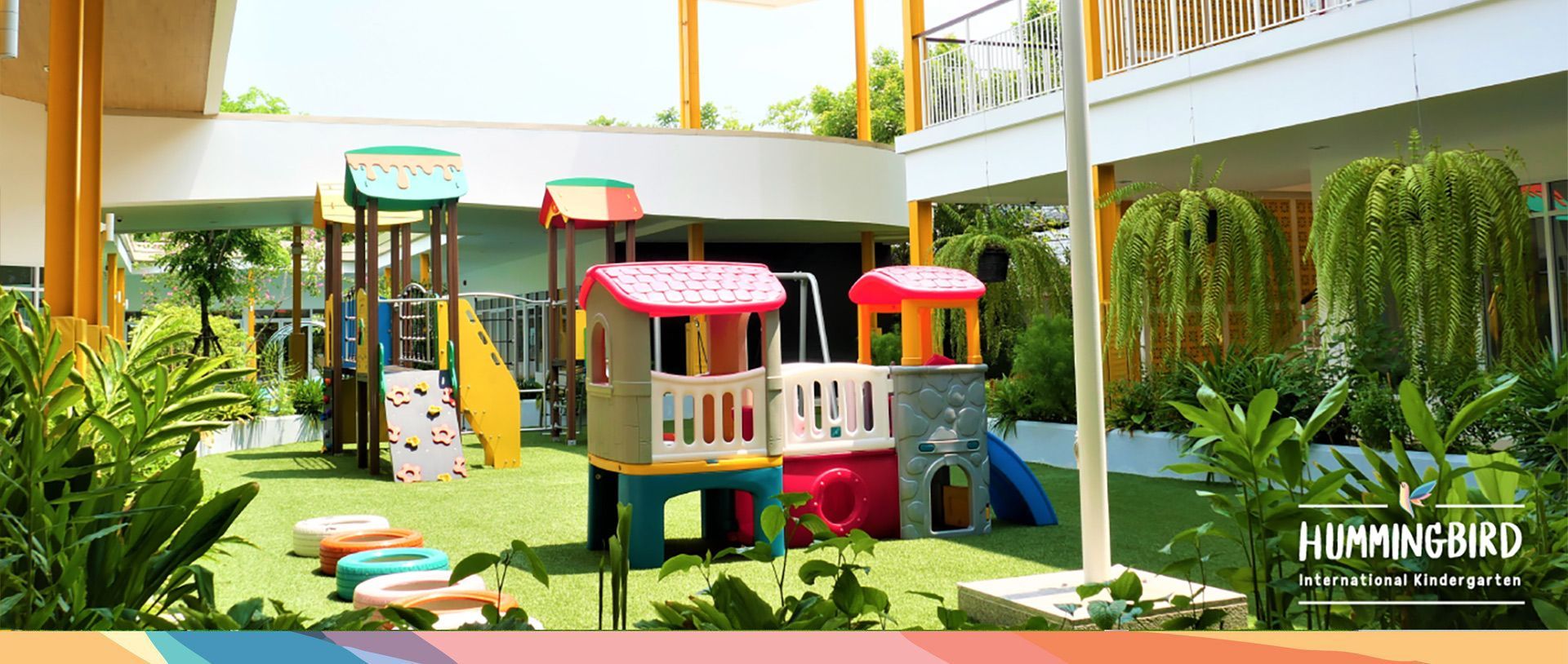 A playground with a train in the middle of it