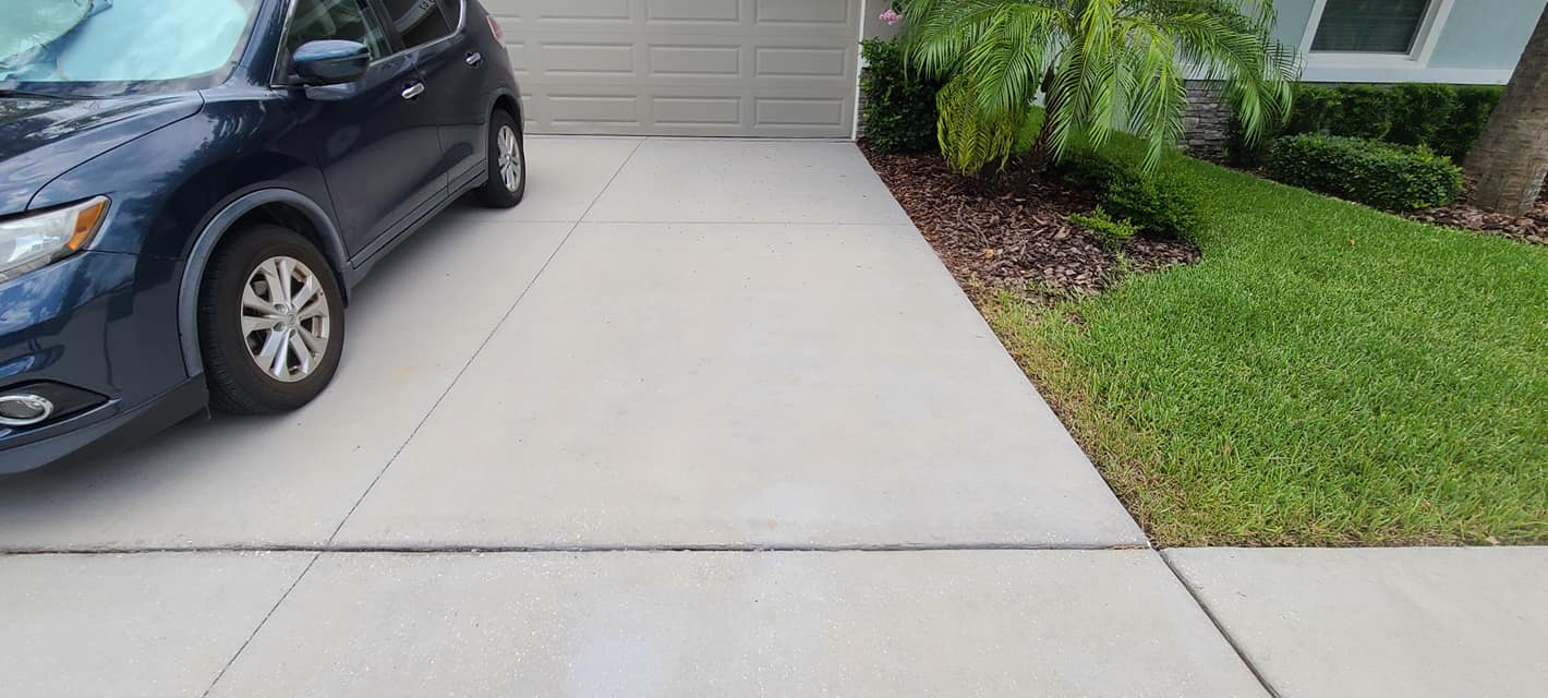Clean driveway — Apollo Beach, FL — EGA Parking Lot Striping & Pressure Washing