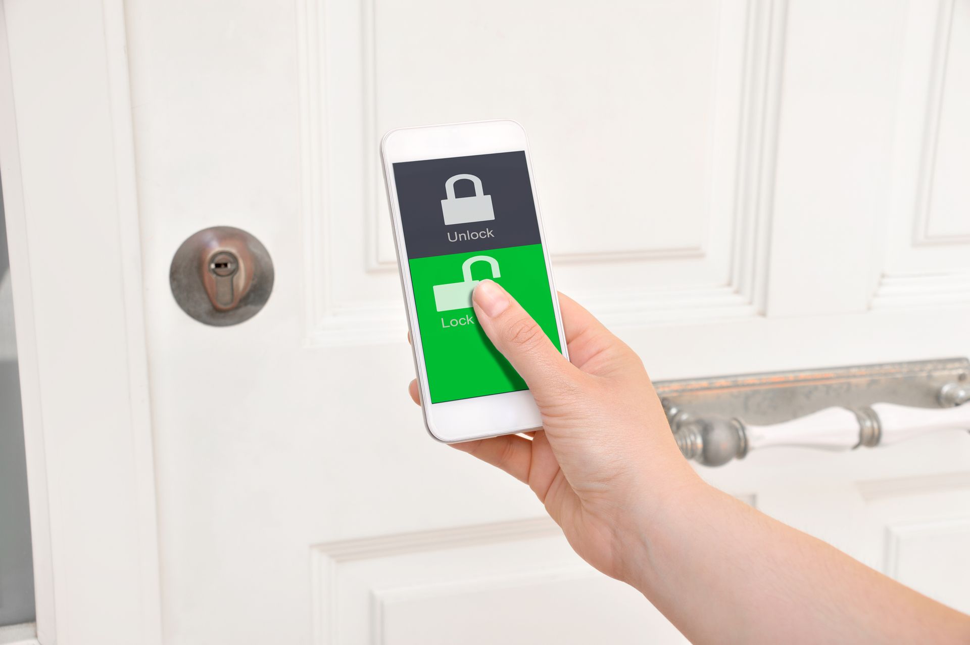 Smartphone displaying remote door access control system features for enhanced property security.