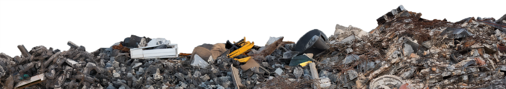 A large pile of garbage is sitting on top of a hill.