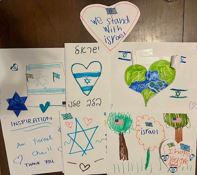 A sign that says we stand with israel