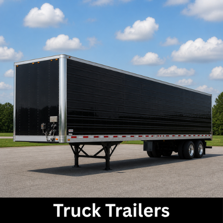 Black enclosed truck trailer parked outdoors on pavement under a blue sky