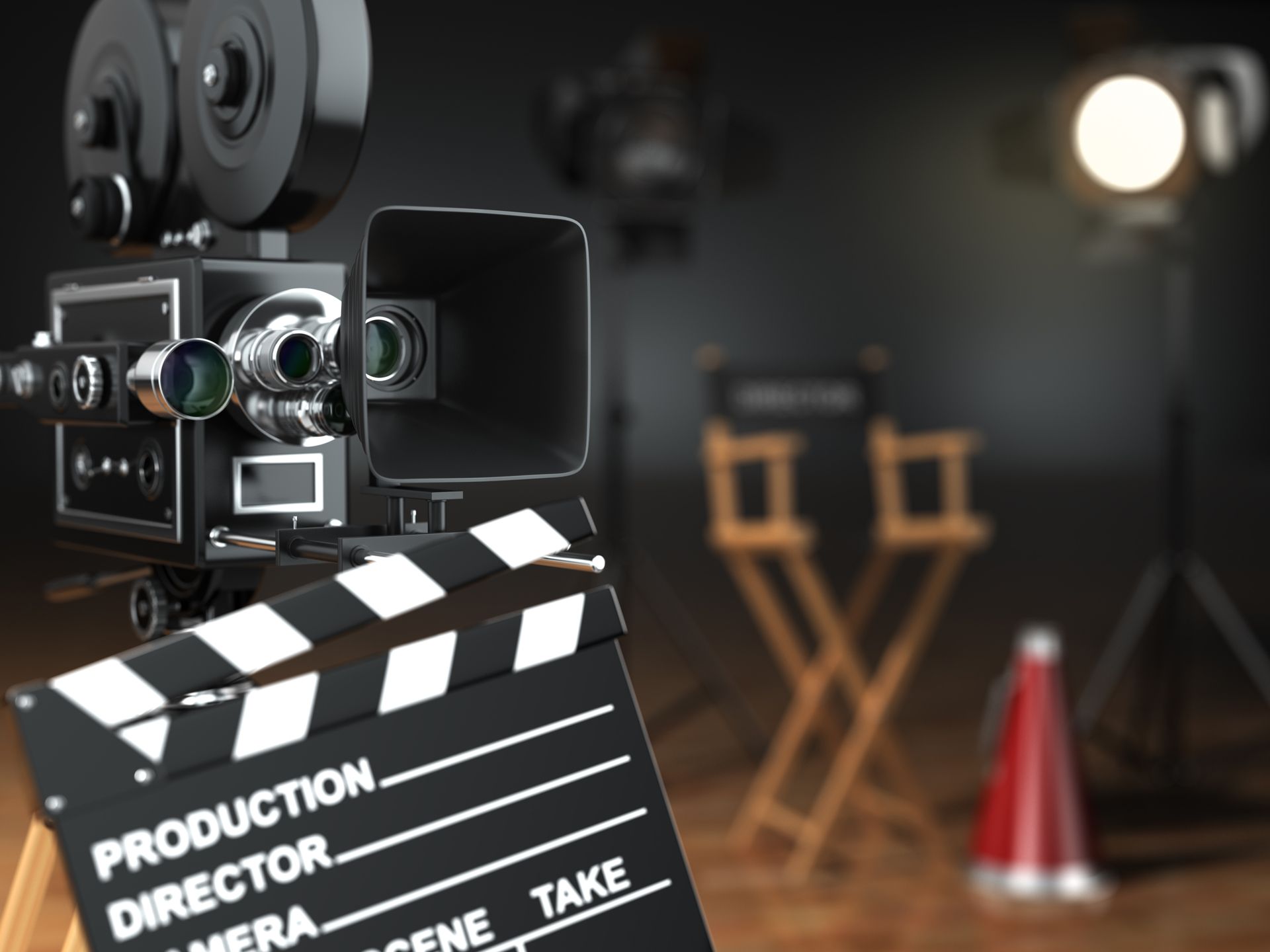 A movie camera is sitting on top of a clapper board