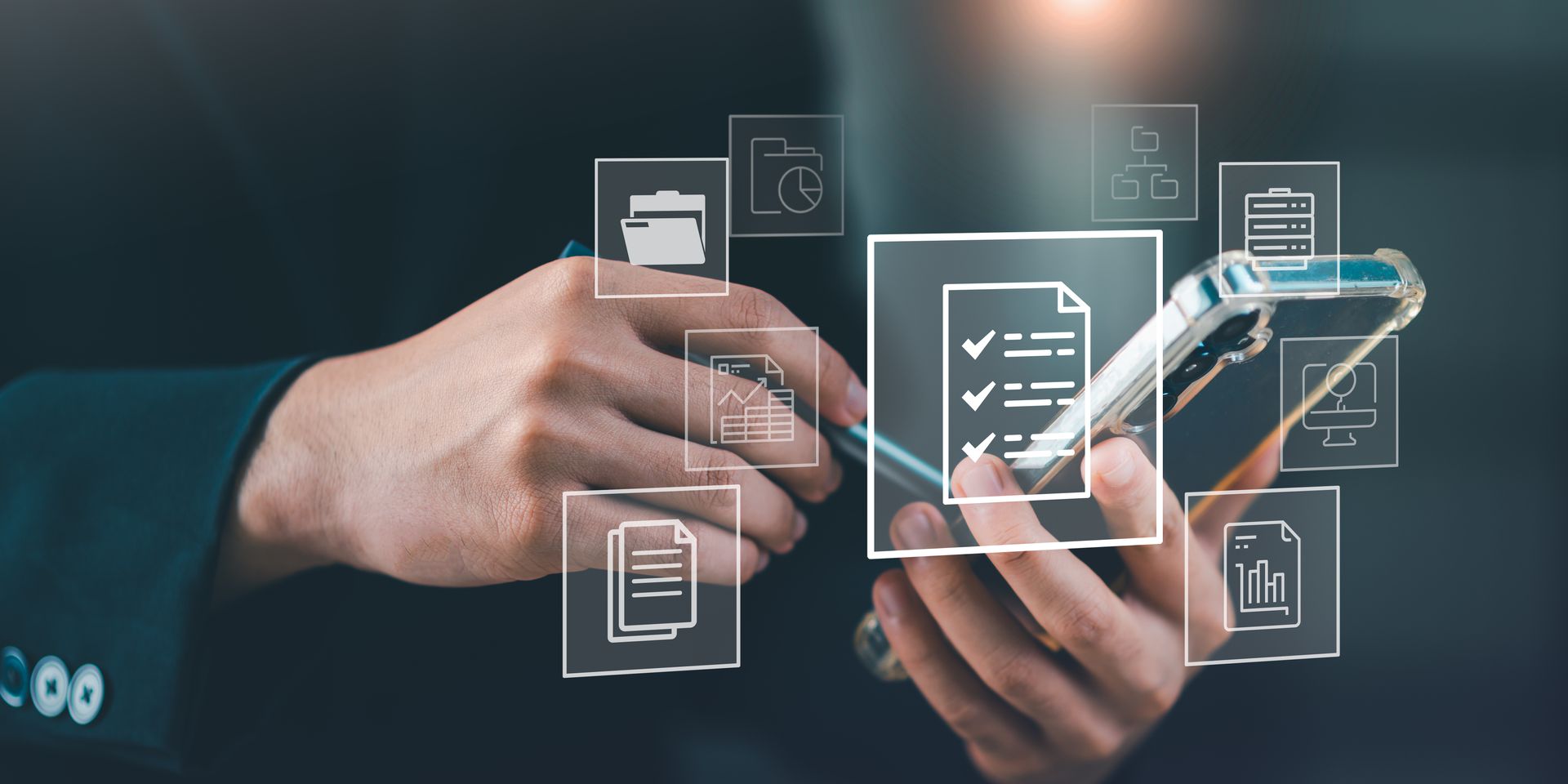 Hands using a smartphone with floating digital document icons in a dark office setting