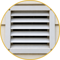 White wall vent with horizontal louvers inside a yellow circle