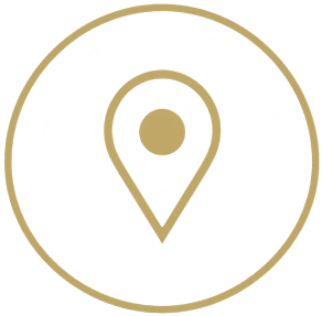 Gold location pin inside a gold circle on a white background