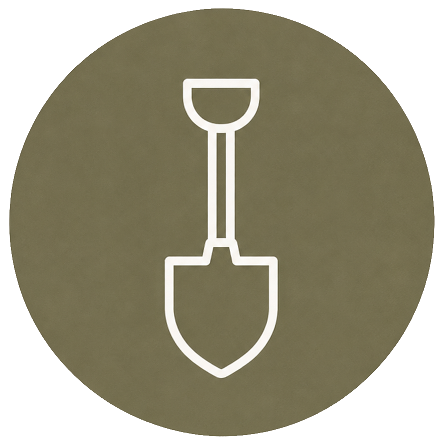 White shovel icon on an olive-green circle background