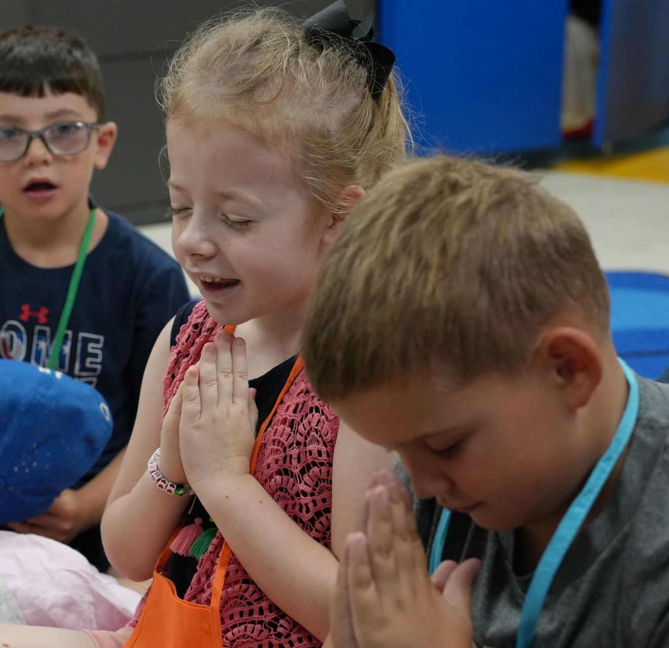 A boy wearing a shirt with the word one on it