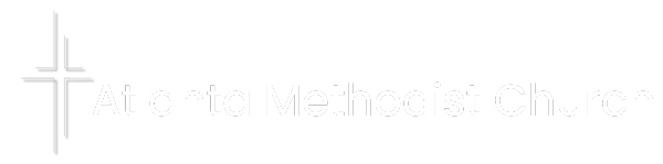 A white logo with a cross and the word jesus on a white background.