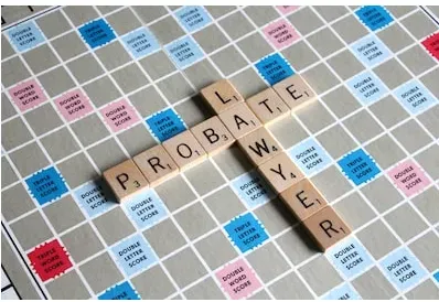 Scrabble tiles spelling “PROBATE” and “LAYER” on a game board.