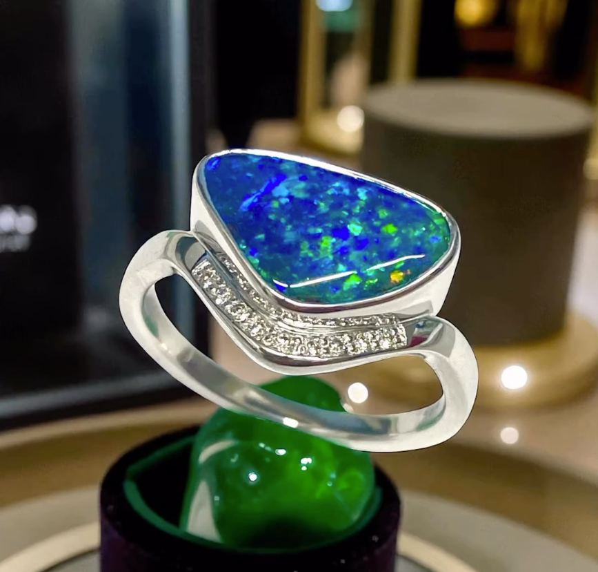 Silver Ring With a Blue Opal Gemstone and Small Diamonds — Regency Jewellers in Cairns City, QLD