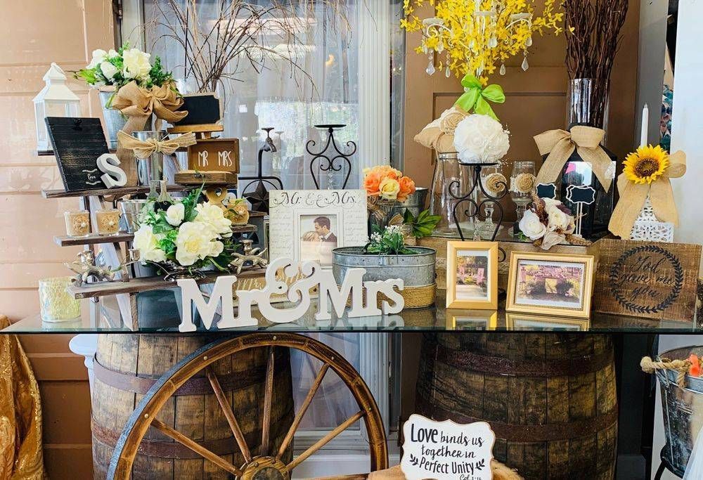 A table with a sign that says mr. and mrs. on it.