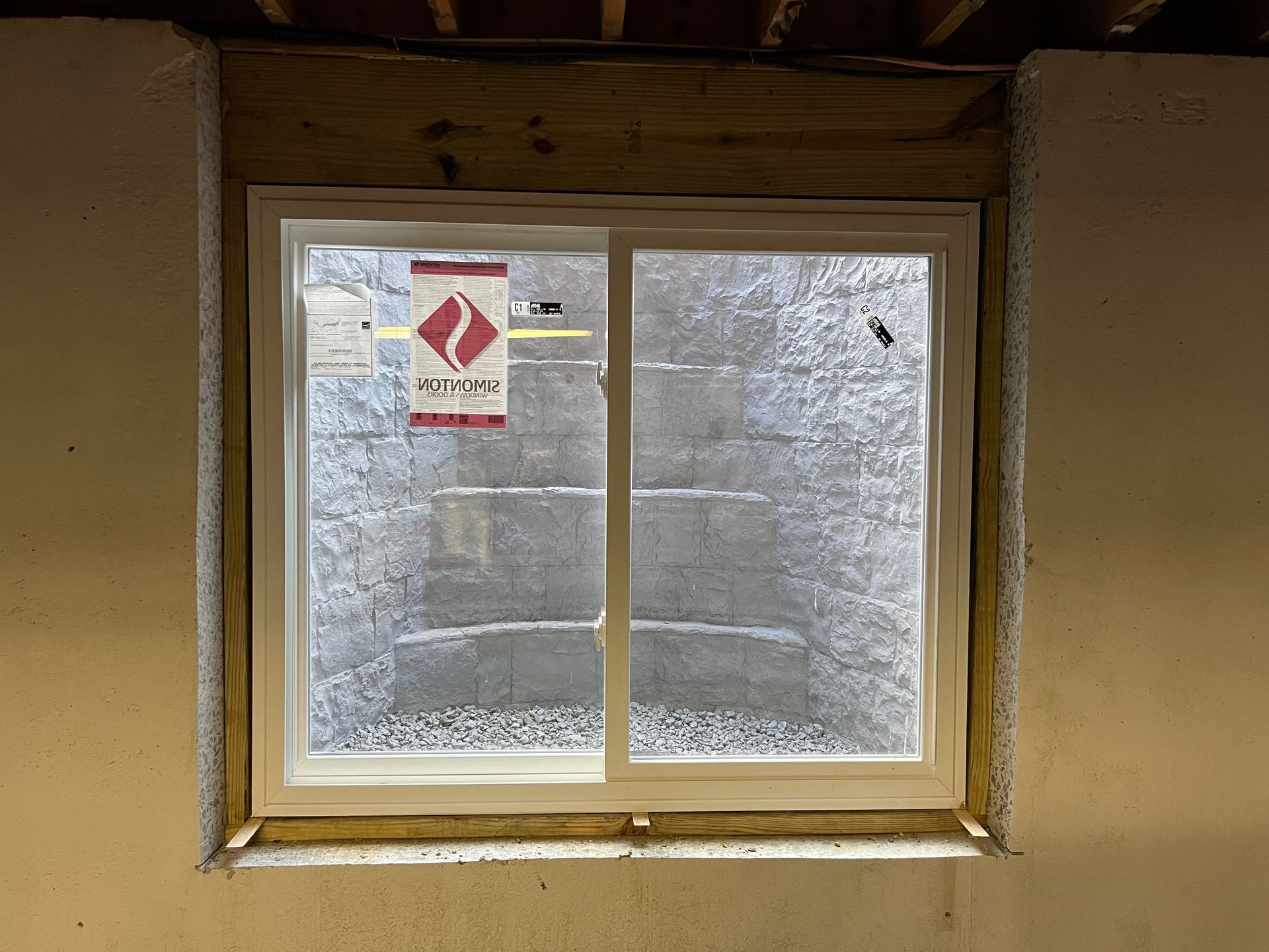 A window with a sticker on it that says ' sliding window '
