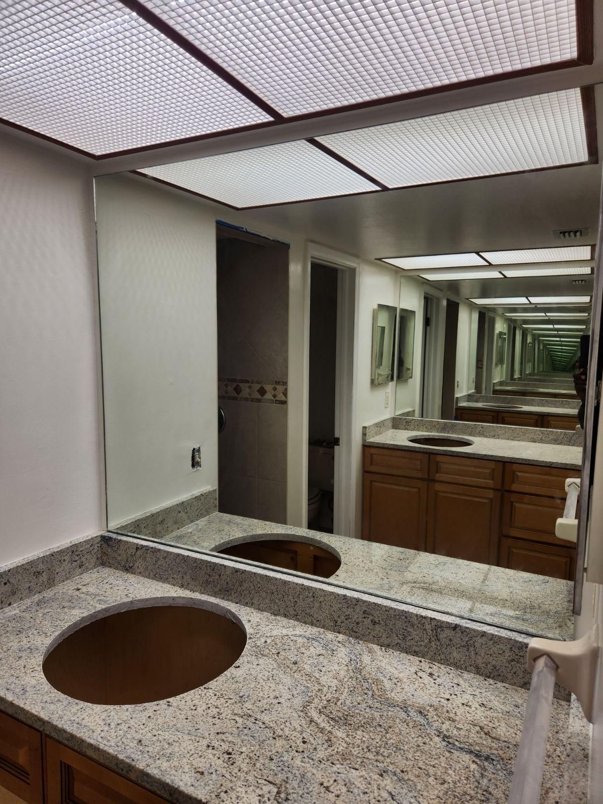 Bathroom mirror done inside a Commercial building in Saint Petersburg, FL