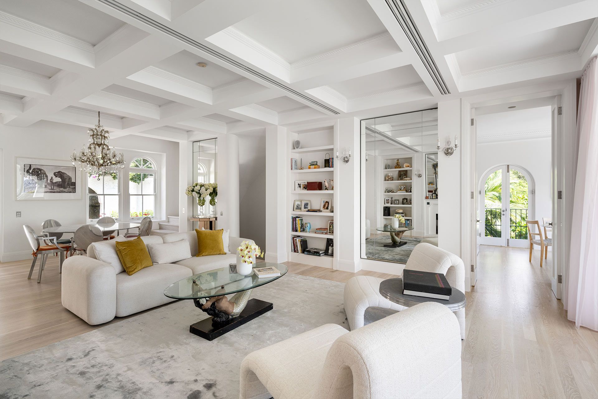 A living room filled with furniture and a coffee table. Mosman