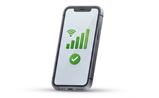 Smartphone with green signal bars, Wi‑Fi icon, and a checkmark on a white background